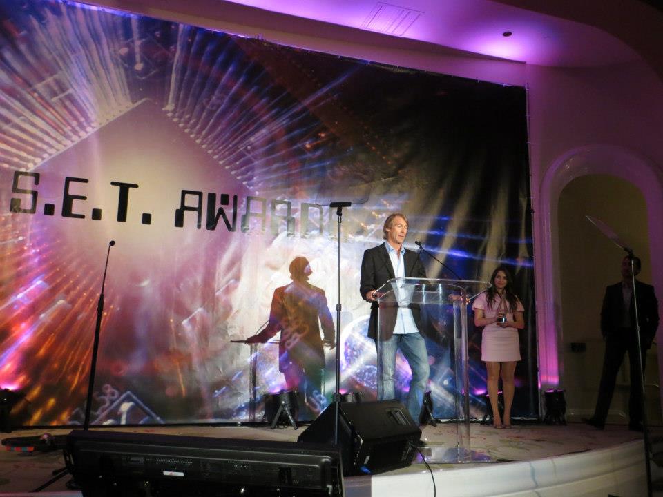 Director Michael Bay won the Legacy Award for his portrayal of science in Armageddon. The award was presented by Shia LaBoeuf (Transformers) who quoted Buzz Lightyear, saying that when you do something daring with style, it's art